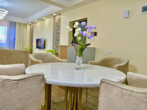 spacious elegant apartment with amazing scenic views,heated swimming pool,free parking space and modern equipped gym
